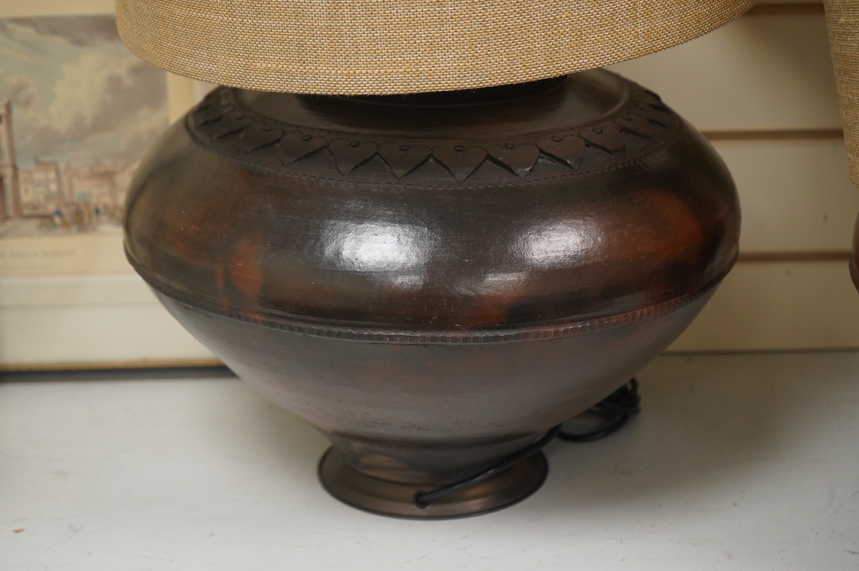 A pair of large brass table lamps and shades, 61cm high
